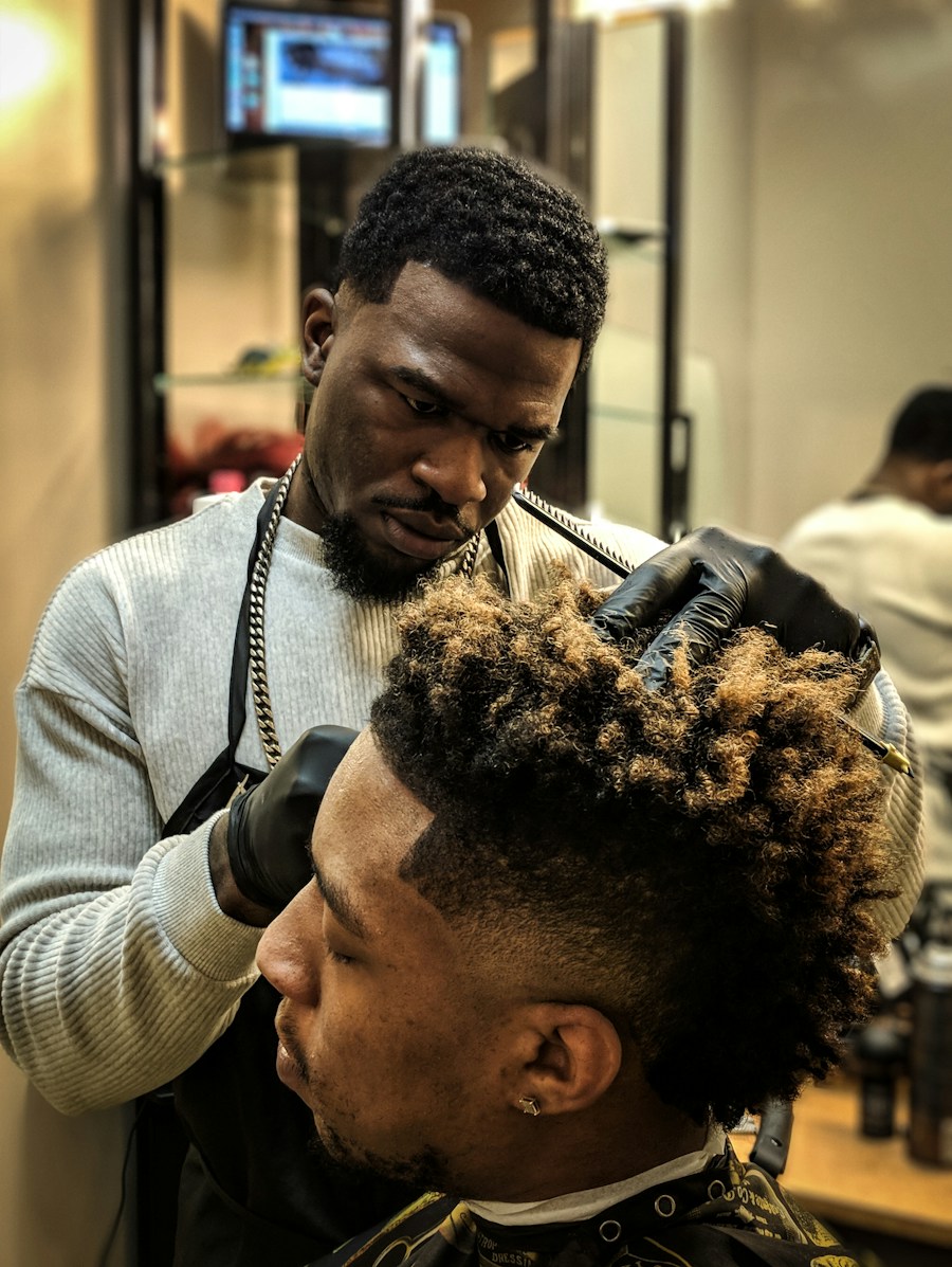 Barber cutting a client's curly hair